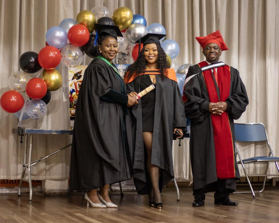 A Centrum Technical College graduate receives her certificate